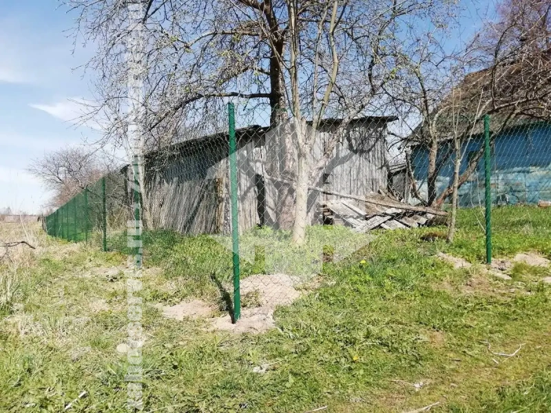Забор из сетки рабицы в натяг с протяжкой арматуры 15 соток